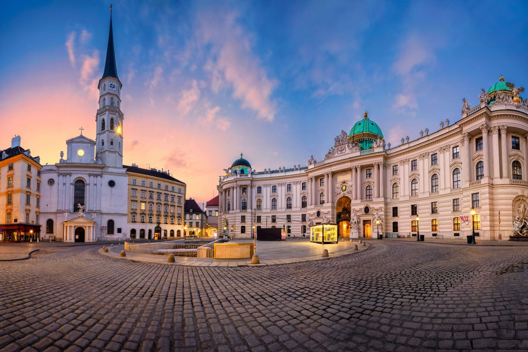 St. Michael's Square with the Hofburg palace in Vienna at dusk